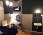 Room image #12 at The New Yorkers Hotel